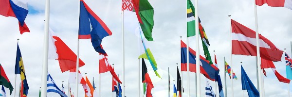 Flags from around the world blowing in the wind
